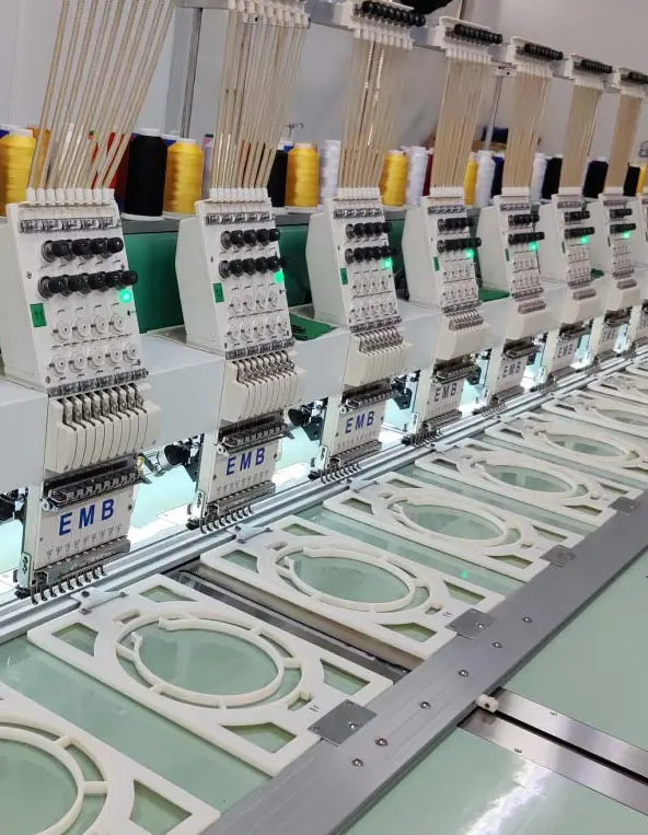 Embroidery machines producing uniforms